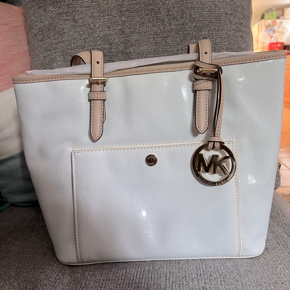 White a Michael Kors bag. Never used all tags still attached.